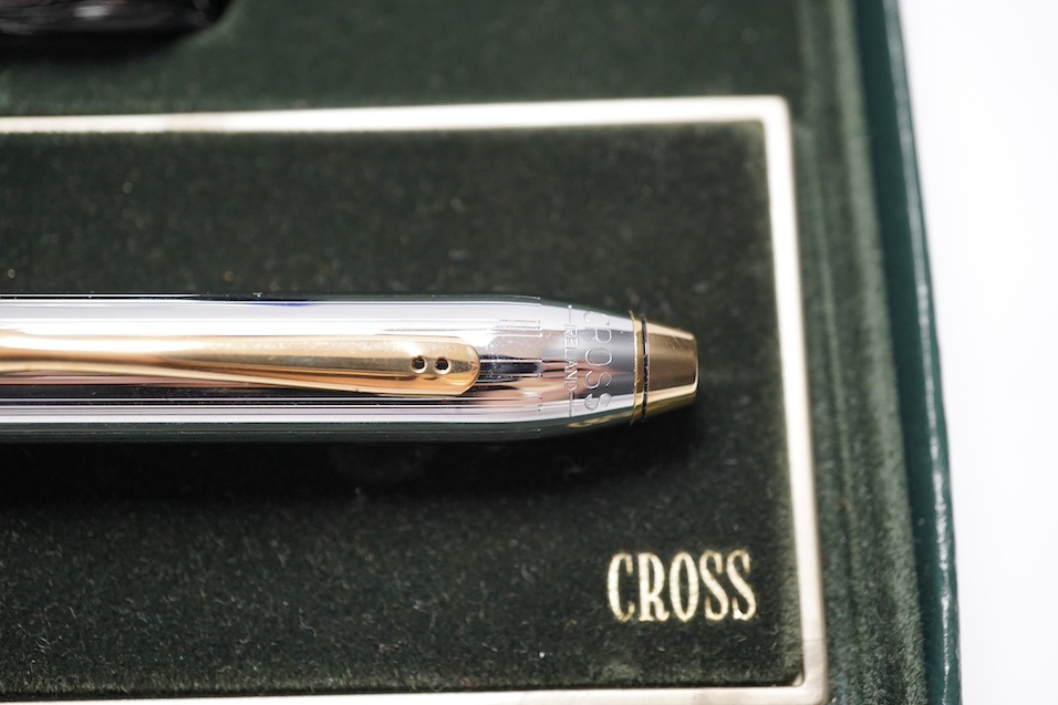 Two boxed pens; a Versace and a Cross, both with outer cardboard boxes. Condition - Versace pen good, display box good, outer box damaged. Cross pen good, ink bottle good, case damaged